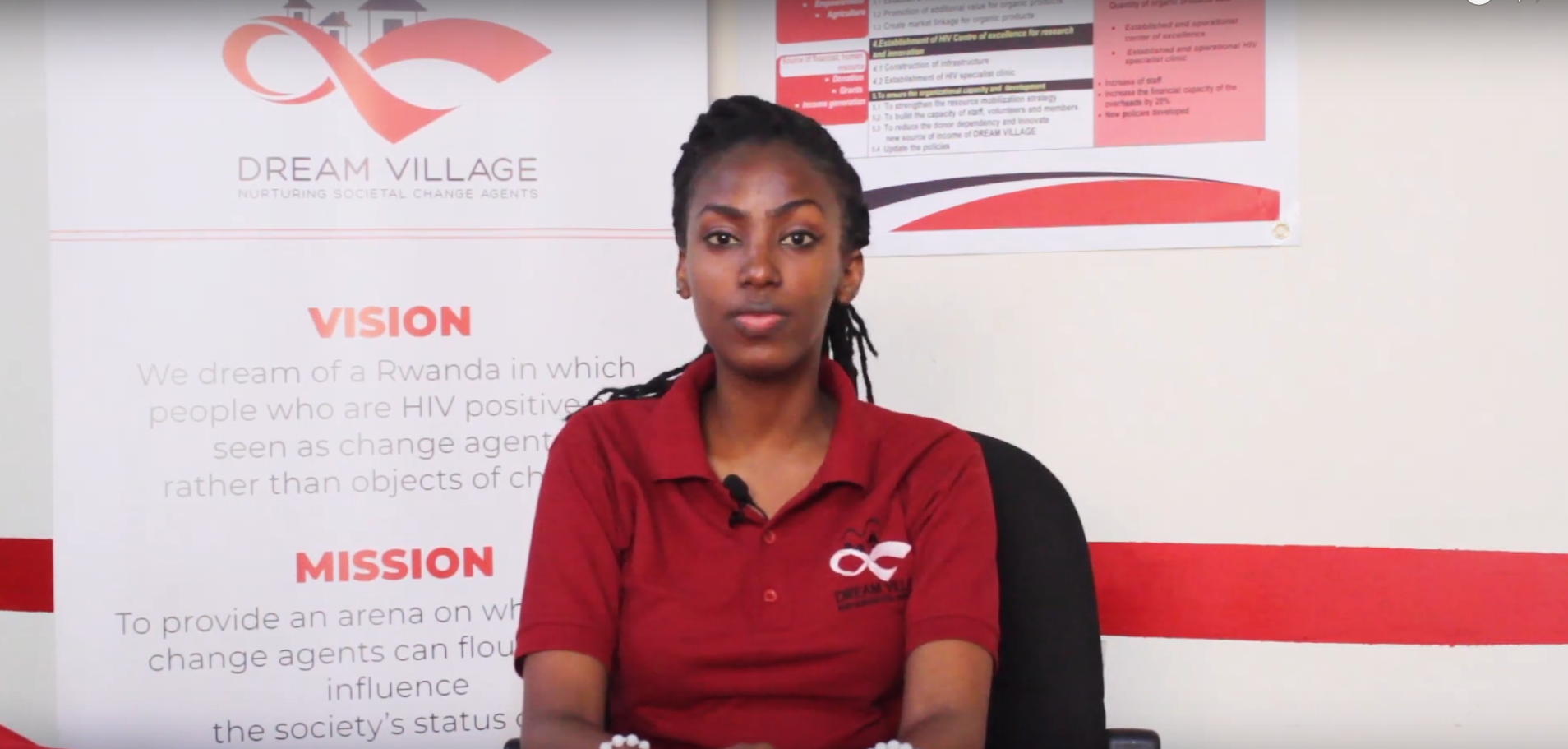 Portrait photo af a beneficiary sitting and looking at the camera